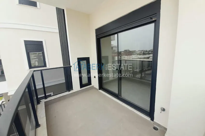 Приобрести Двухкомнатная квартира с чистовой отделкой в новом комплексе – Алания, район Авсаллар 14 