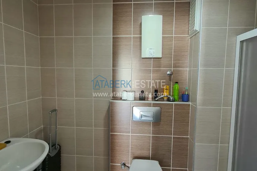 Приобрести Двухэтажная квартира с мебелью и сауной в центре Алании на первой береговой - район пляжа Клеопатра. Недвижимость под ВНЖ 14 