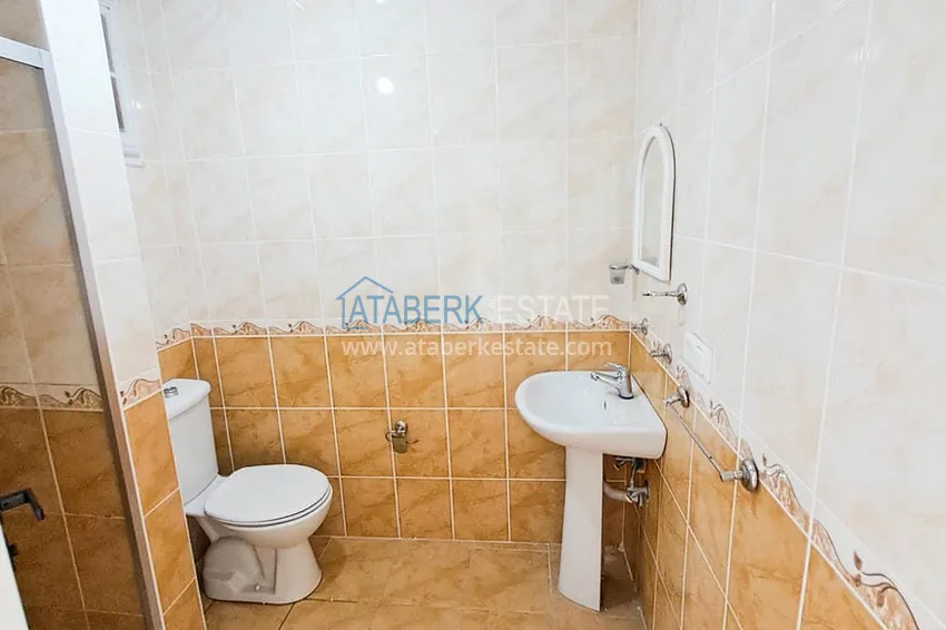 Приобрести Просторная трехкомнатная квартира с видом на море и горы в районе Махмутлар, Алания  15 