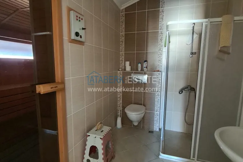 Приобрести Двухэтажная квартира с мебелью и сауной в центре Алании на первой береговой - район пляжа Клеопатра. Недвижимость под ВНЖ 15 