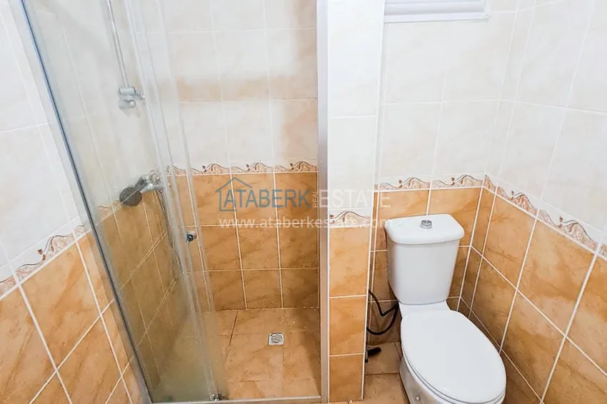 Приобрести Просторная трехкомнатная квартира с видом на море и горы в районе Махмутлар, Алания  16 