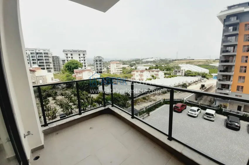 Приобрести Двухкомнатная квартира с чистовой отделкой в новом комплексе – Алания, район Авсаллар 16 