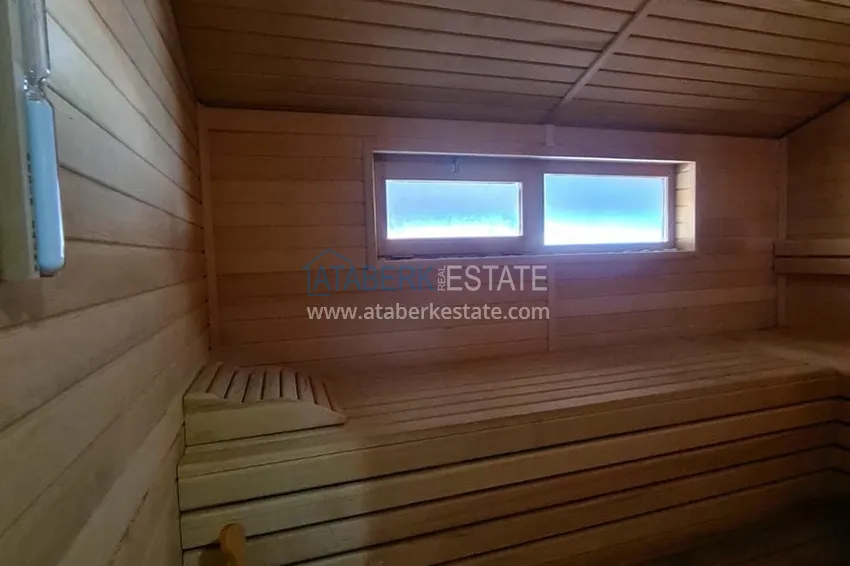 Приобрести Двухэтажная квартира с мебелью и сауной в центре Алании на первой береговой - район пляжа Клеопатра. Недвижимость под ВНЖ 16 