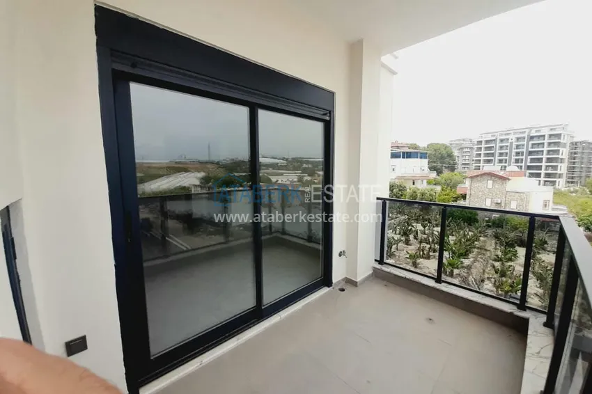 Приобрести Двухкомнатная квартира с чистовой отделкой в новом комплексе – Алания, район Авсаллар 17 