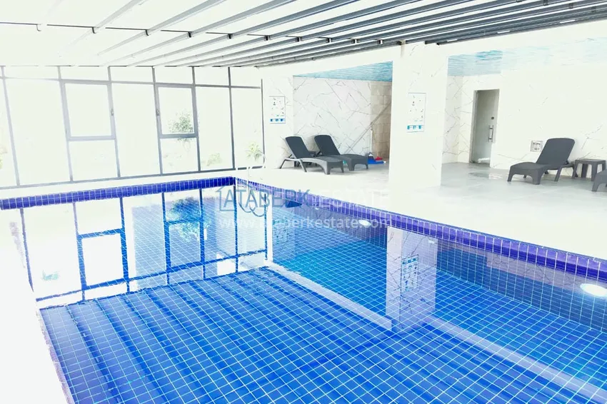 Двухкомнатная квартира под ключ с застекленным балконом в Алании, район Авсаллар. Доступна рассрочка 12 