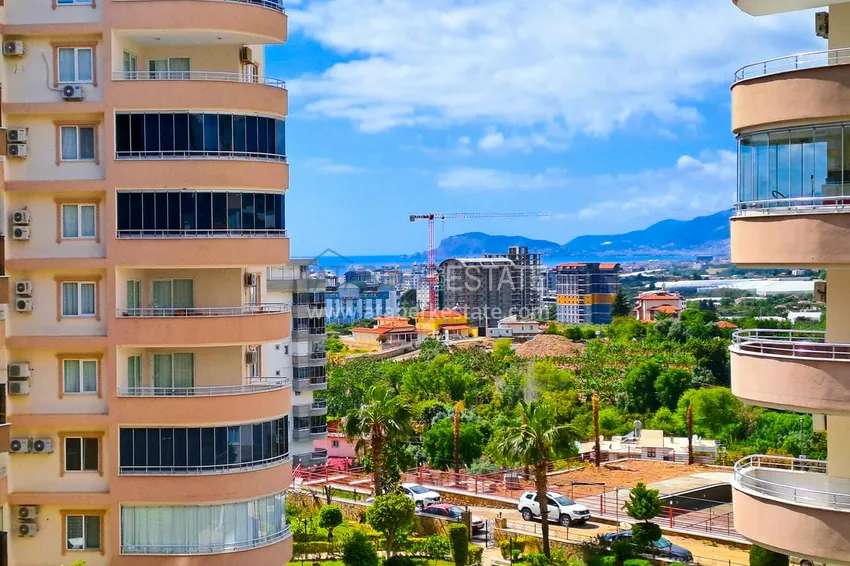 Приобрести Просторная трехкомнатная квартира с видом на море и горы в районе Махмутлар, Алания  19 