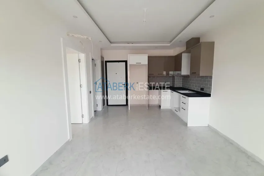 Приобрести Двухкомнатная квартира с чистовой отделкой в новом комплексе – Алания, район Авсаллар 1 