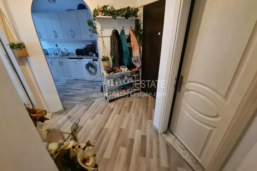 Приобрести Трехкомнатная меблированная квартира в Махмутларе - вторая береговая линия от моря 1 