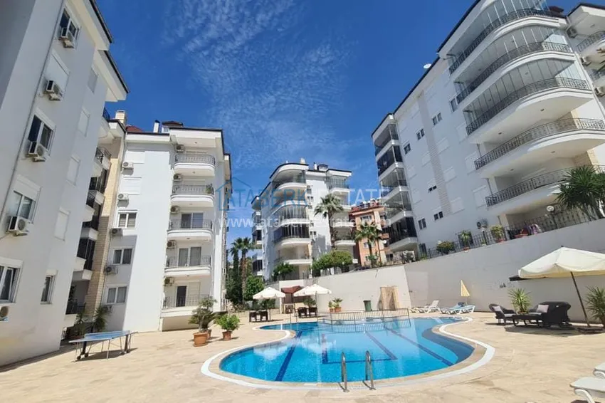 Квартира в районе Джикджилли трехкомнатная, с мебелью и застекленным балконом 1 