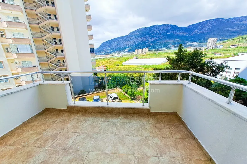 Приобрести Просторная трехкомнатная квартира с видом на море и горы в районе Махмутлар, Алания  24 