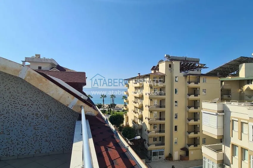 Приобрести Двухэтажная квартира с мебелью и сауной в центре Алании на первой береговой - район пляжа Клеопатра. Недвижимость под ВНЖ 24 