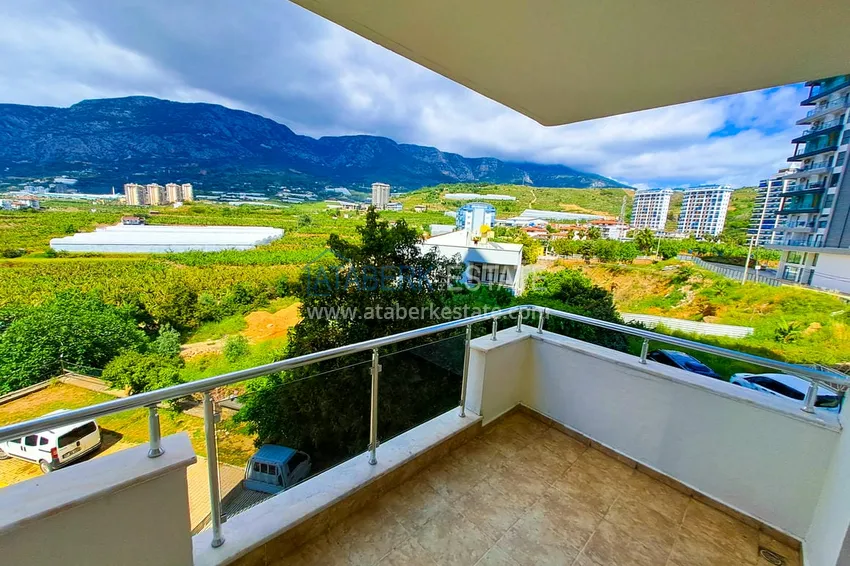 Приобрести Просторная трехкомнатная квартира с видом на море и горы в районе Махмутлар, Алания  26 