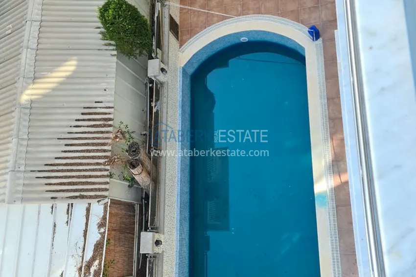 Приобрести Двухэтажная квартира с мебелью и сауной в центре Алании на первой береговой - район пляжа Клеопатра. Недвижимость под ВНЖ 26 