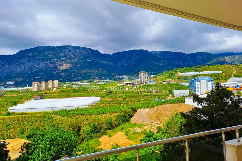 Приобрести Просторная трехкомнатная квартира с видом на море и горы в районе Махмутлар, Алания  28 