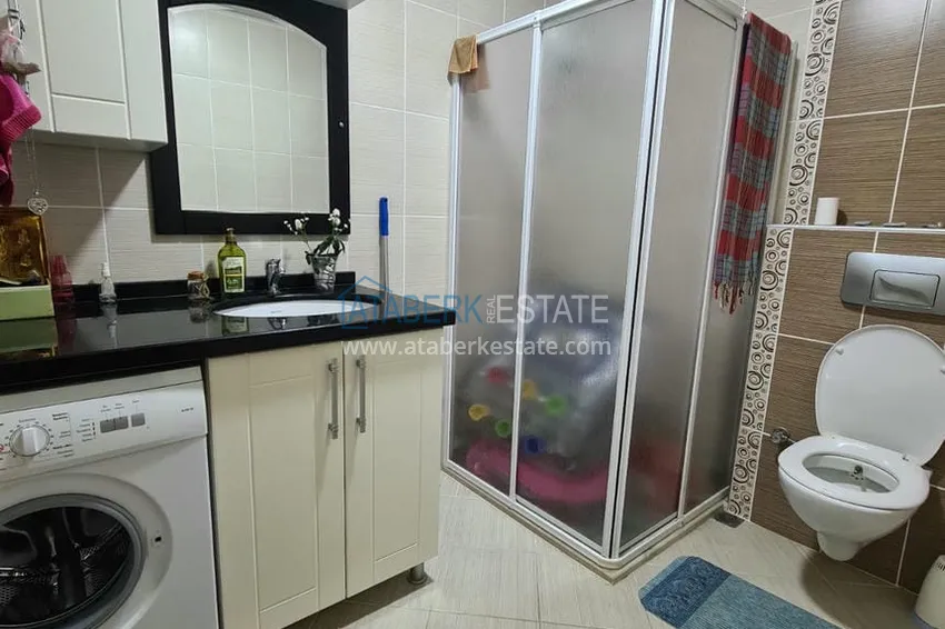 Приобрести Двухэтажная квартира с мебелью и сауной в центре Алании на первой береговой - район пляжа Клеопатра. Недвижимость под ВНЖ 4 