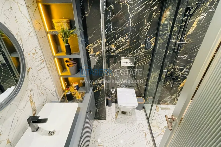 Приобрести Квартиры 4+1 с видом на море в новом жилом комплексе в районе Давултепе-Мерсин 27