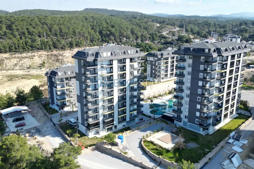 Двухкомнатная квартира под ключ с застекленным балконом в Алании, район Авсаллар. Доступна рассрочка 4 