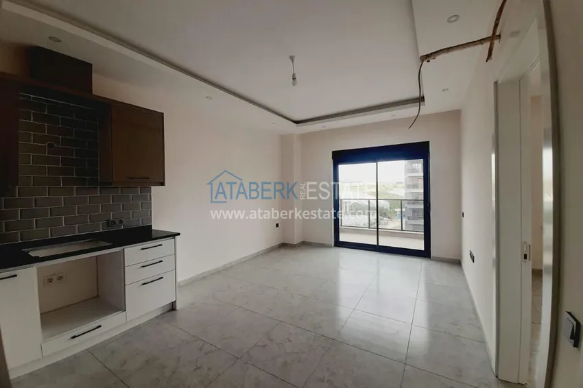 Приобрести Двухкомнатная квартира с чистовой отделкой в новом комплексе – Алания, район Авсаллар 4 