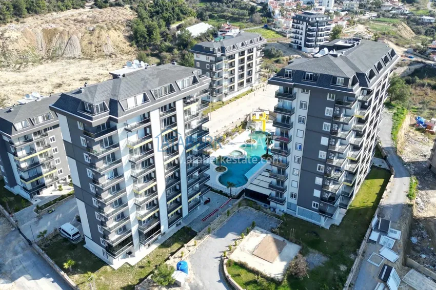 Двухкомнатная квартира под ключ с застекленным балконом в Алании, район Авсаллар. Доступна рассрочка 5 