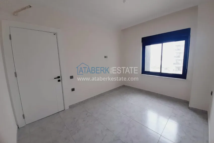 Приобрести Двухкомнатная квартира с чистовой отделкой в новом комплексе – Алания, район Авсаллар 5 