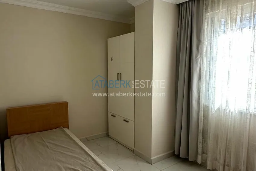 Приобрести Трехкомнатная квартира в Алании, район Оба в уютном комплексе городского типа 5