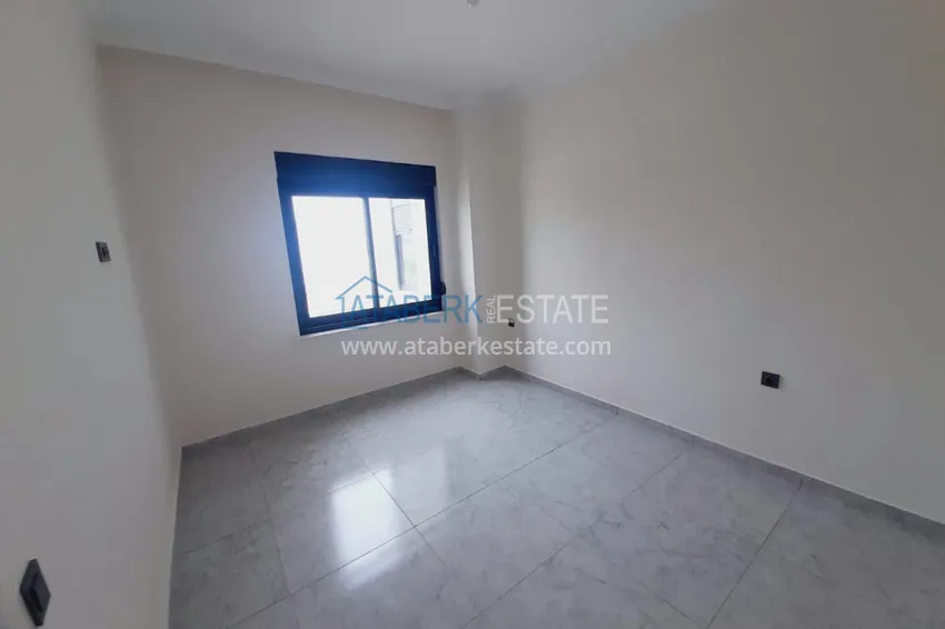 Приобрести Двухкомнатная квартира с чистовой отделкой в новом комплексе – Алания, район Авсаллар 6 