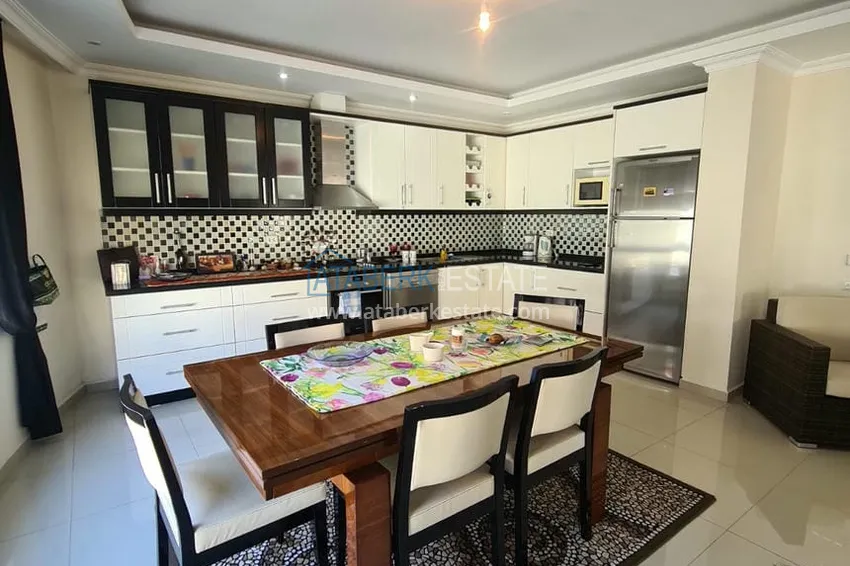 Приобрести Двухэтажная квартира с мебелью и сауной в центре Алании на первой береговой - район пляжа Клеопатра. Недвижимость под ВНЖ 8 