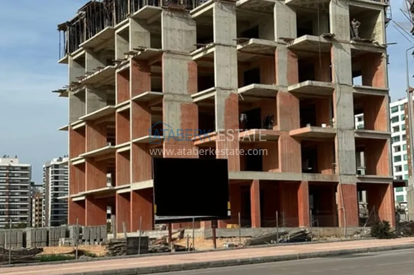 Фото - Квартиры 1+1 в новом жилом комплексе на стадии строительства район Соли – Мерсин 1