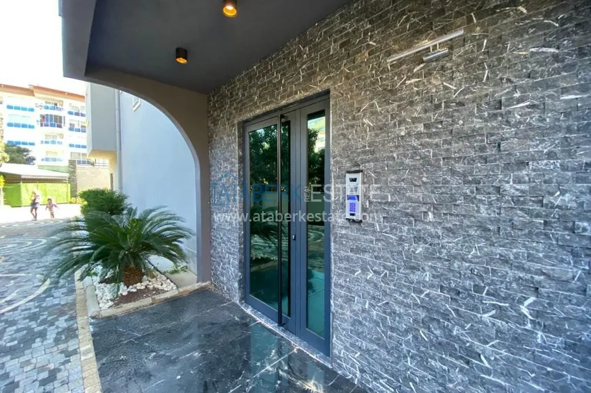 Двухкомнатная квартира с современным интерьером в Алании, район Оба 9 