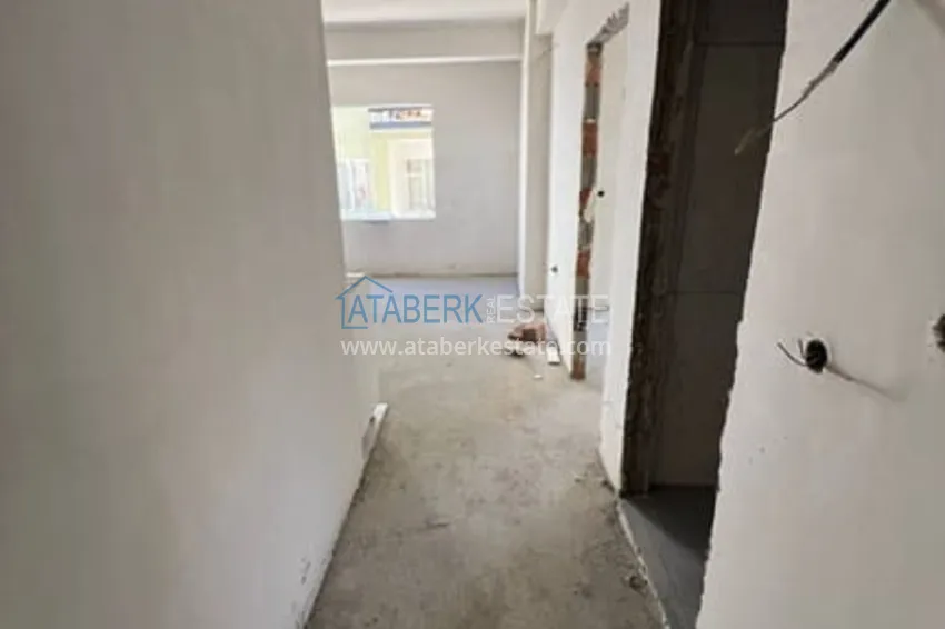 Приобрести Квартира 1+1 на завершающем этапе строительства в шаговой доступности от моря Эрдемли-Мерсин 1 