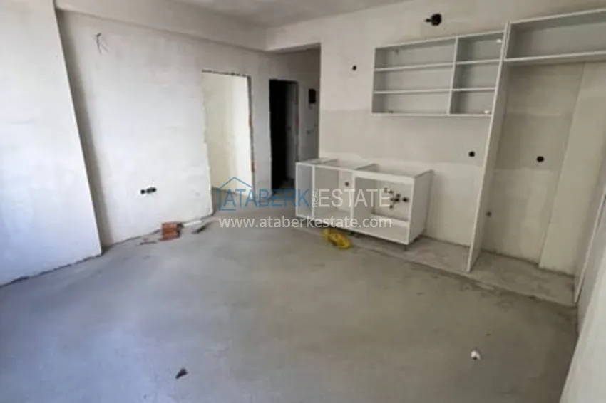 Приобрести Квартира 1+1 на завершающем этапе строительства в шаговой доступности от моря Эрдемли-Мерсин 2 