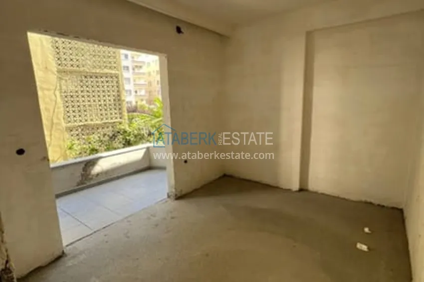 Приобрести Квартира 1+1 на завершающем этапе строительства в шаговой доступности от моря Эрдемли-Мерсин 4 