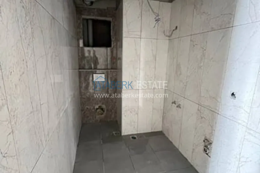 Приобрести Квартира 1+1 на завершающем этапе строительства в шаговой доступности от моря Эрдемли-Мерсин 5 