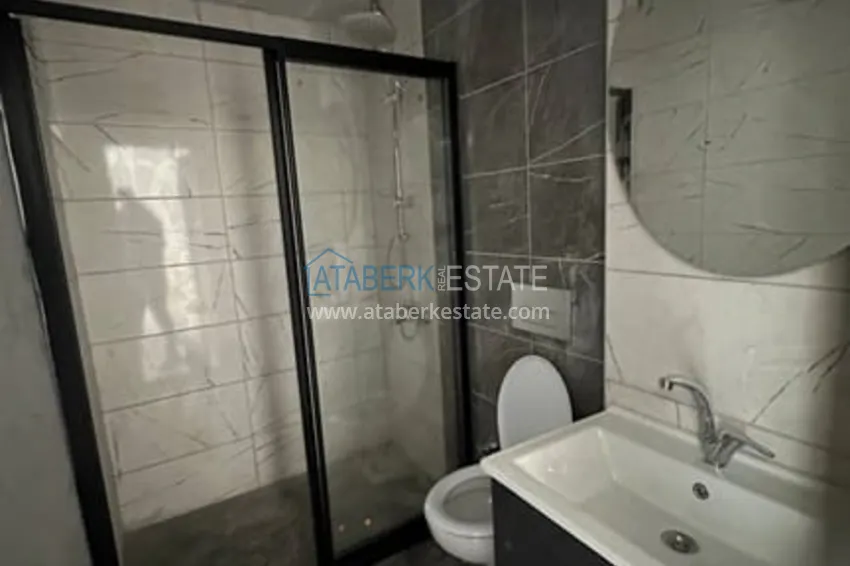 Приобрести Квартира 1+1 в новом жилом комплексе от собственника Арпачбахшиш-Мерсин 9 