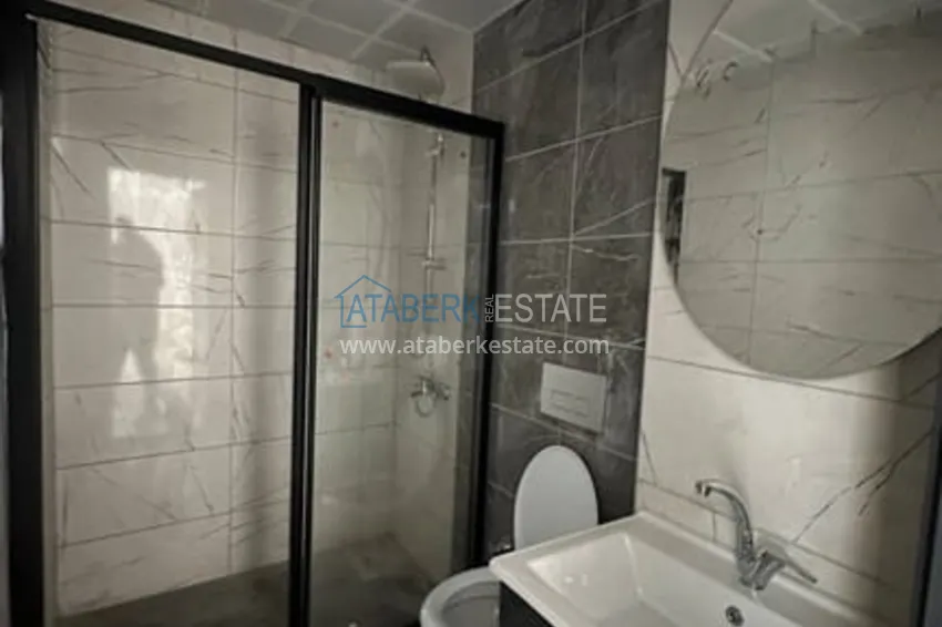 Приобрести Квартира 1+1 в новом жилом комплексе от собственника Арпачбахшиш-Мерсин 10 