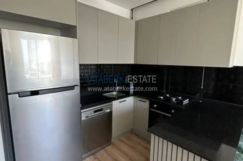 Приобрести Квартира 1+1 меблированная в новом жилом комплексе в районе Арпачбахшиш-Мерсин 2 