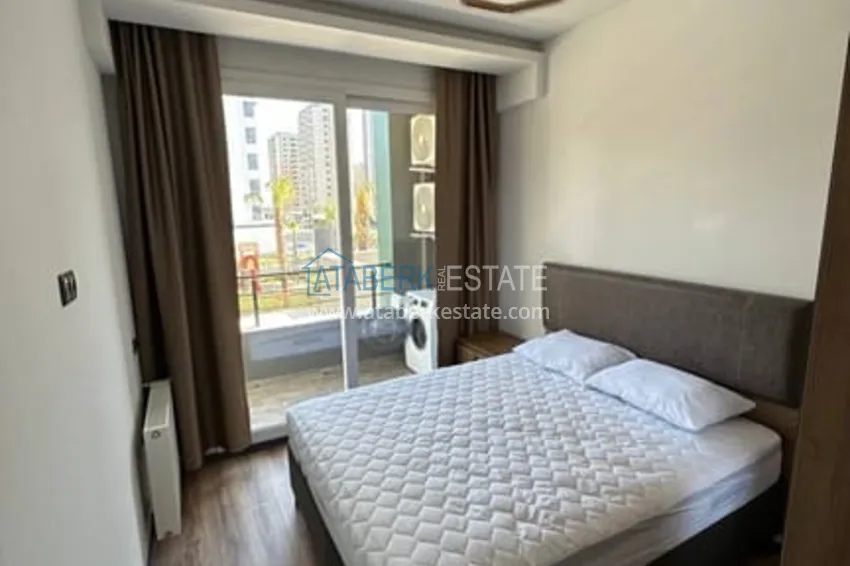 Приобрести Квартира 1+1 меблированная в новом жилом комплексе в районе Арпачбахшиш-Мерсин 4 