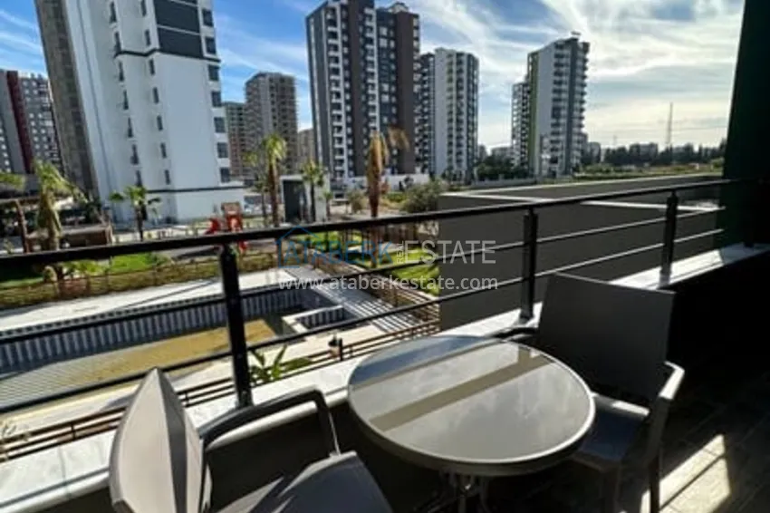 Приобрести Квартира 1+1 меблированная в новом жилом комплексе в районе Арпачбахшиш-Мерсин 7 