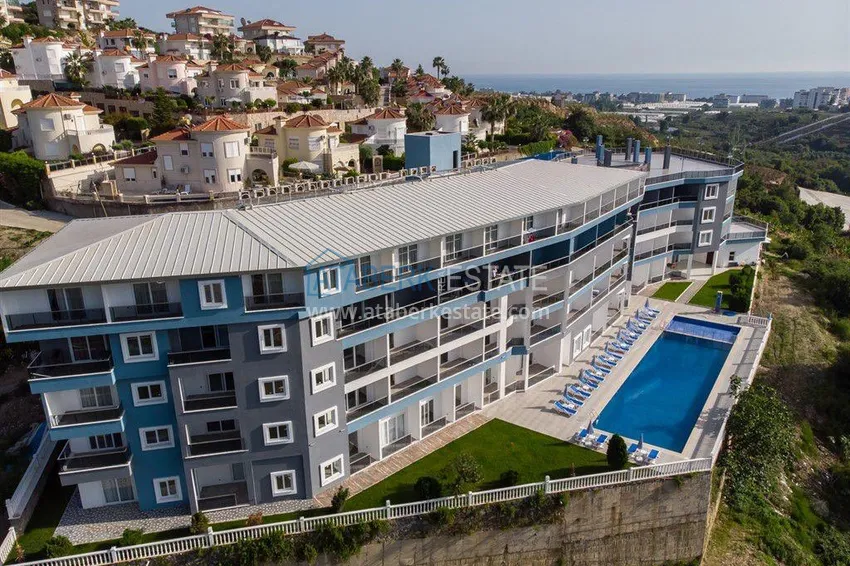 Квартира-студия с мебелью и боковым видом на море в Алании, район Каргыджак 1 