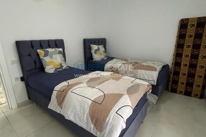 Приобрести Великолепные террасные апартаменты с мебелью и видом на море в Алании, район Махмутлар 11 