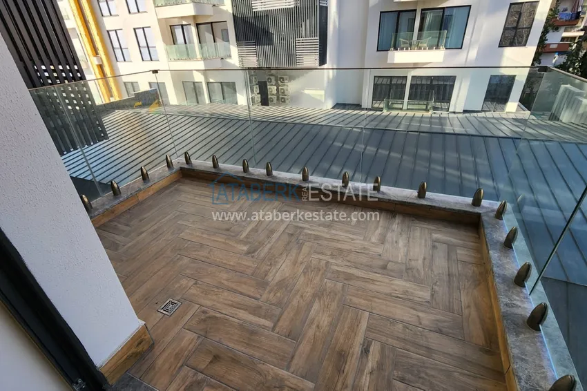 Приобрести Квартира с чистовой отделкой на первой береговой линии - Алания, район Махмутлар 12 