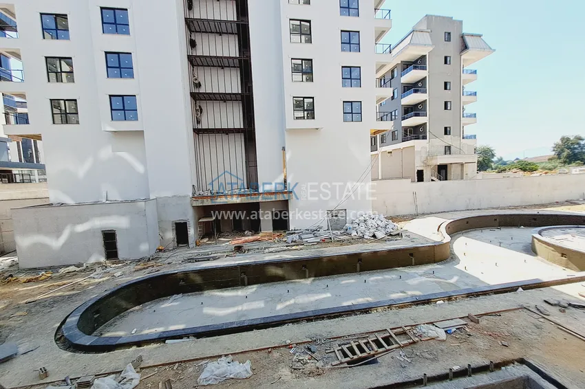 Приобрести Продается двухкомнатная квартира в Алании, район Махмутлар, с чистовой отделкой 9