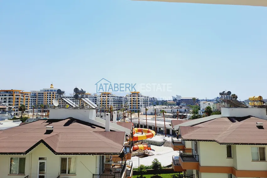 Приобрести Двухкомнатная квартира 85 м2 в строящемся комплекс-отеле в Алании, район Тюрклер 10 