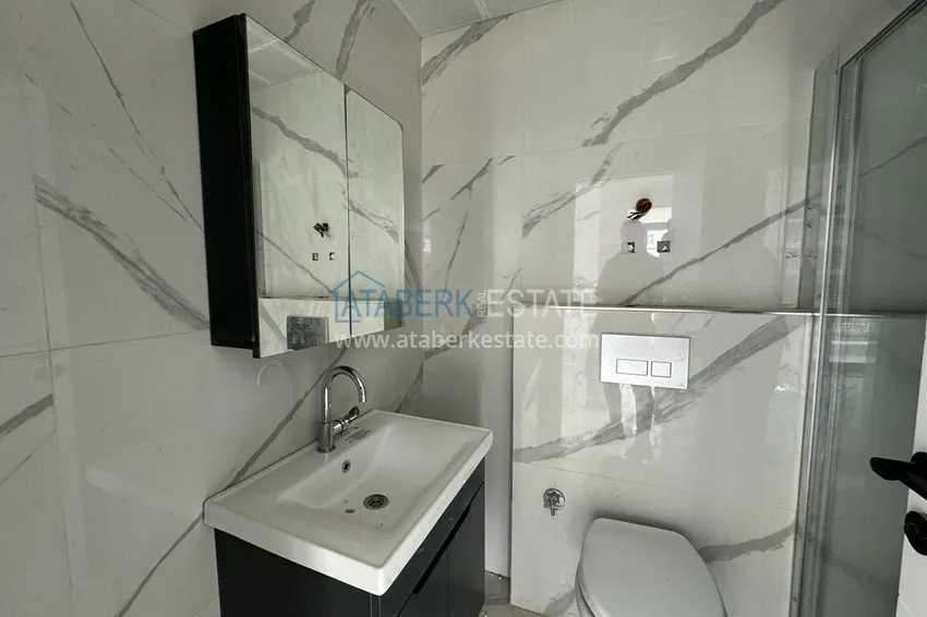 Приобрести Новостройки Алании. Двухкомнатная квартира с чистовой отделкой в районе Махмутлар 10