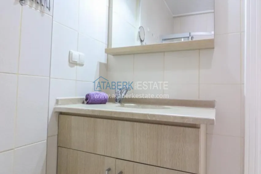 Приобрести Трехкомнатная квартира с мебелью и видом на море в Алании, район Тосмур 10 