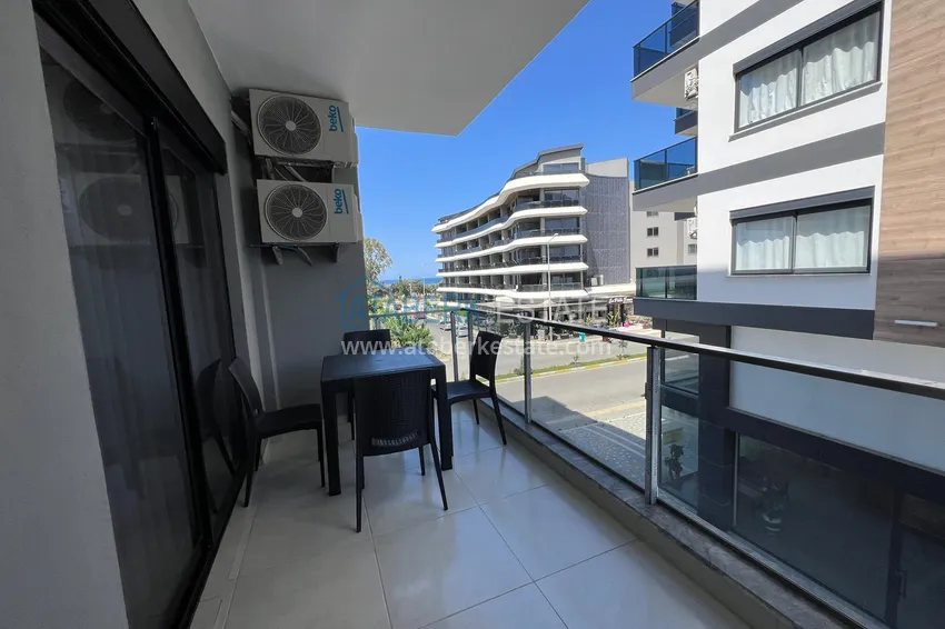 Приобрести Двухкомнатная квартира с частичным видом на море – Каргыджак, Алания, 100 метров от моря 11