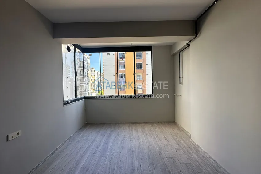 Приобрести Просторные двухкомнатные квартиры в новом комплексе в центре района Мезитли, Мерсин 12 