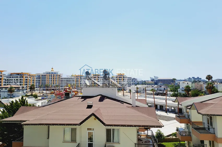 Приобрести Двухкомнатная квартира 85 м2 в строящемся комплекс-отеле в Алании, район Тюрклер 11 