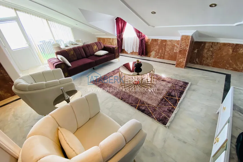 Приобрести Роскошный видовой дуплекс с дизайнерским ремонтом и новой мебелью на первой береговой в Махмутларе, Алания 16 