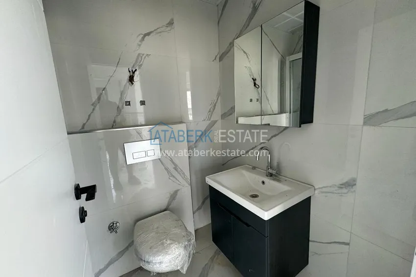 Приобрести Новостройки Алании. Двухкомнатная квартира с чистовой отделкой в районе Махмутлар 11